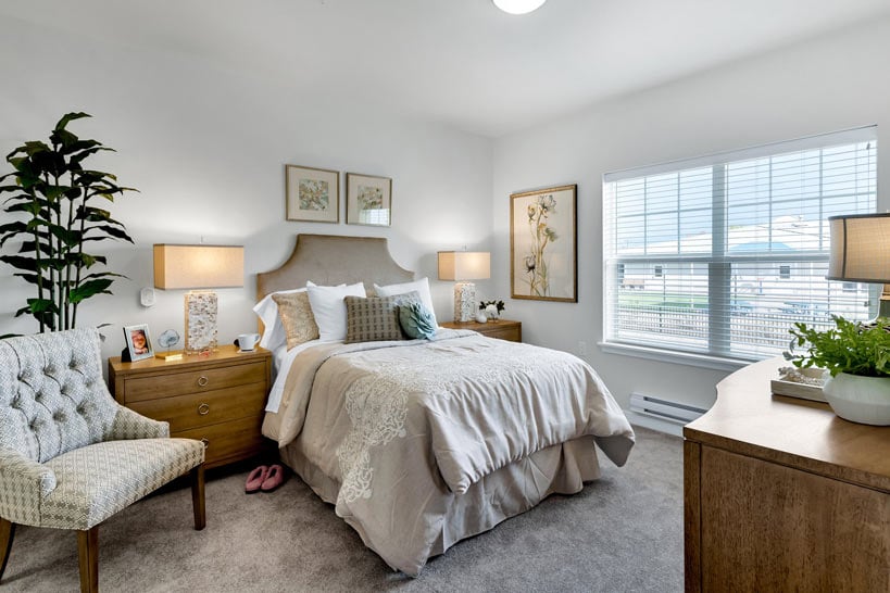 A furnished bedroom in a Julian Estates apartment